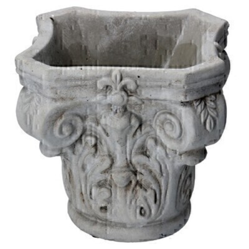This concrete stone effect pot cover with a decorative design is made by the London based designer Gisela Graham who designs really beautiful gifts for your home and garden. It is suitable for an artifical or real plant. Great to show off your plants and would make an ideal gift for a gardener or someone who likes plants.